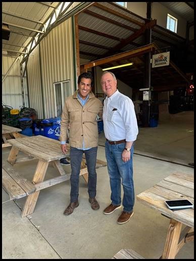 Speaker Robert Rivas and U.S. Senator Adam Schiff stand together at Braga Farms Tour