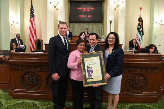 Assembly Speaker Anthony Rendon honors Idonia Ramos as the 2017 Woman of the Year for the 63rd Assembly District