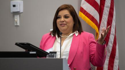 Keynote speaker Johana Hernández at podium