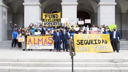 Asm. Robert Rivas with excluded worker advocates in support of AB 2847