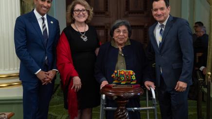 Asm. Robert Rivas presents a Latino Spirit Award to Irene Tovar