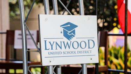 Lynwood Unified School District sign on fence