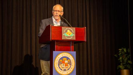 Guest speaker at podium, speaking