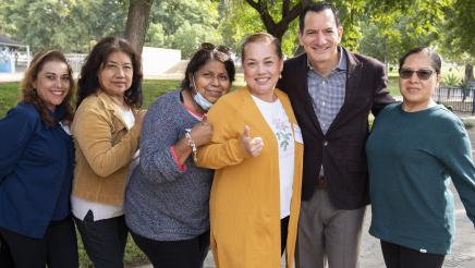 Speaker Rendon with group of attendees