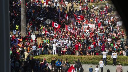 Supporters and onlookers observe a UFW rally.