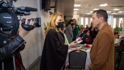 Speaker Rendon being interviewed by Telemundo reporter