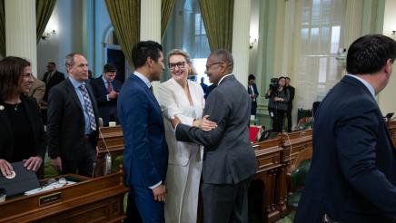 Speaker Rivas talks with Assemblymembers Buffy Wicks and Reggie Jones-Sawyer