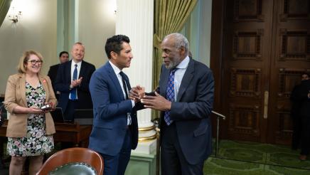 Speaker Rivas and Danny Glover
